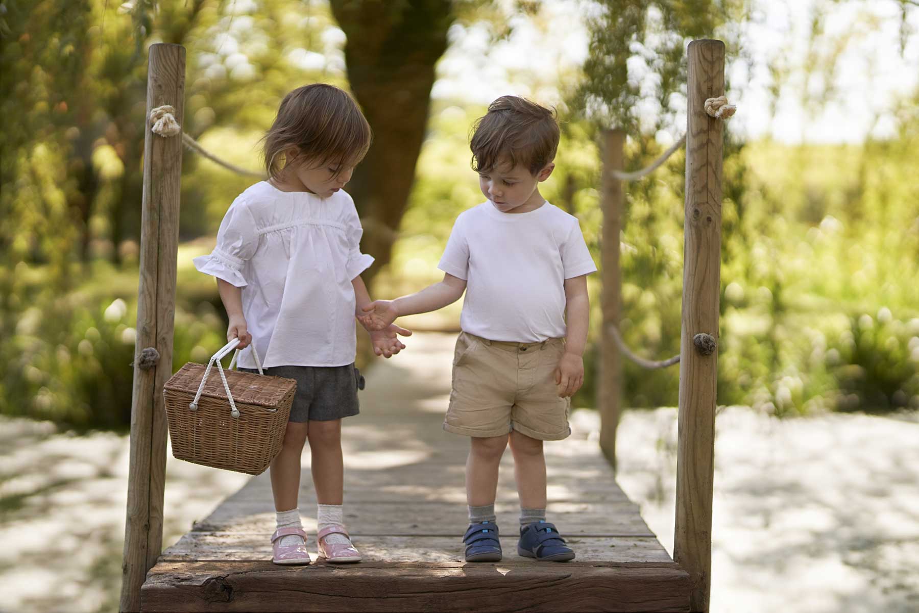 Girl and Boy on Bridge